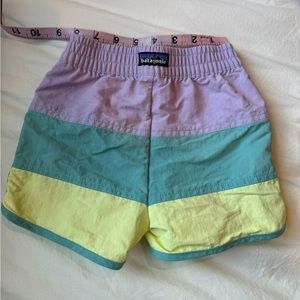 Patagonia swim shorts 4T. Runs small in my opinion. Perfect shape